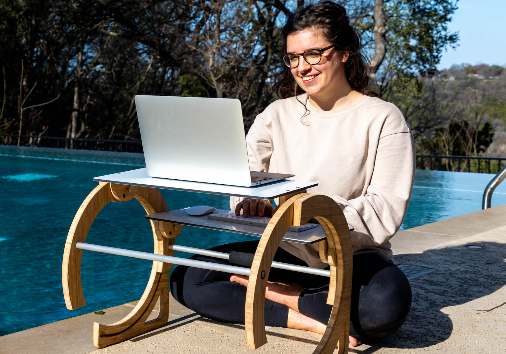 sitting cross legged desk